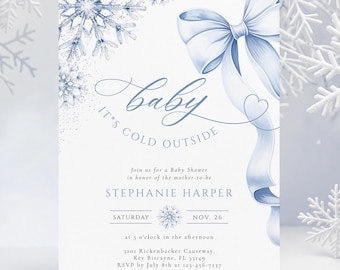 May include: A baby shower invitation with a winter theme. The invitation features a light blue bow and snowflake illustrations on a white background. The text reads "Baby It's Cold Outside" and includes event details.
