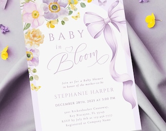 May include: A baby shower invitation with the text "BABY in Bloom" in elegant script. The design features watercolor flowers in shades of purple and yellow, a large lavender bow, and the event details.
