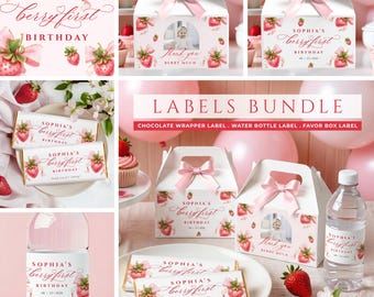 May include: A party favor bundle featuring white gable boxes, chocolate bar wrappers, and water bottle labels with a strawberry and pink bow theme. The text reads Sophia's berry first birthday, thank you berry much, and includes a date.