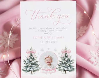 May include: A pink and white thank you card with the text "Thank you" in cursive. The card includes a photo of a baby, two Christmas trees, and the name "SOPHIA WILLIAMS" with the date 12|28|2025.