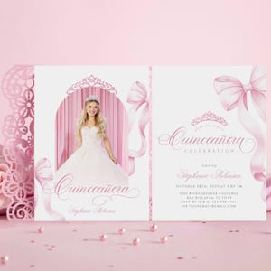May include: A pink Quinceañera invitation card featuring a young woman in a white gown and tiara. The card design includes decorative bows, ribbons, and the words "Quinceañera Celebration" in elegant script. The invitation includes event details.