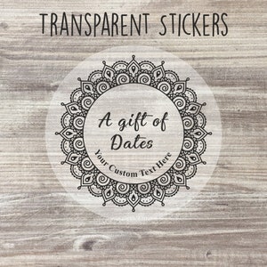 May include: Transparent sticker featuring a black and white mandala design. The sticker reads "A gift of Dates" and "Your Custom Text Here".