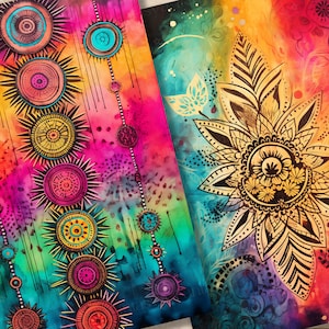 May include: Two colorful abstract digital art prints with mandala designs. The left print features a rainbow background with a series of concentric circles in shades of gold, pink, and blue. The right print features a gold mandala with a floral design on a rainbow background.