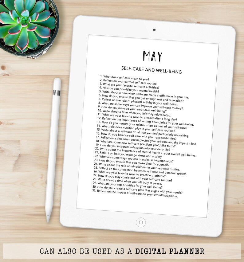 May include: A digital planner on a white tablet with the title "MAY SELF-CARE AND WELL-BEING." The screen displays a list of self-care prompts. A succulent plant and a stylus are visible. Text at the bottom reads "CAN ALSO BE USED AS A DIGITAL PLANNER."