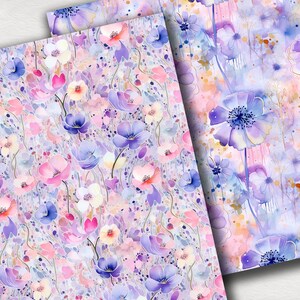 Op de afbeelding: Een naadloos patroon met aquarelbloemen in tinten van paars, roze en blauw op een witte achtergrond. De bloemen zijn in een willekeurig patroon gerangschikt en hebben een zachte, dromerige uitstraling.
