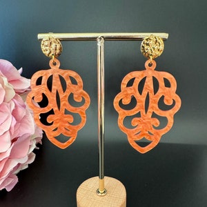 Large orange resin ornament earrings, statement earrings