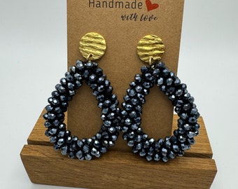 Blue-black faceted pearl earrings