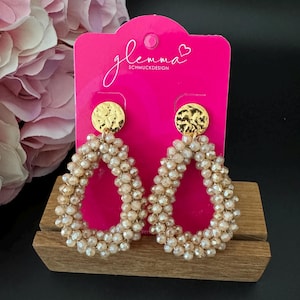 Beige faceted pearl statement earrings