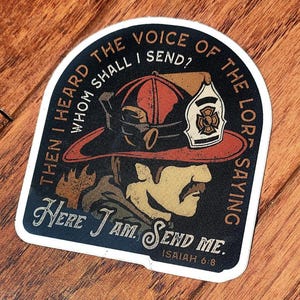 May include: A sticker featuring a firefighter's helmet and a quote from Isaiah 6:8. The design includes the text "Then I heard the voice of the Lord saying, Whom shall I send? Here I am. Send me."