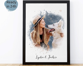 May include: A watercolor painting of a woman with a dog. The woman is wearing a hat and a brown jacket. The dog is a white German Shepherd. The painting has a blue background with white splatters of paint. The text "Lydia & Jackie" is written at the bottom of the painting.