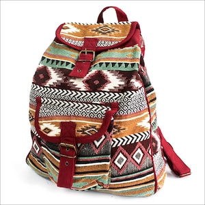 May include: A patterned backpack in a Southwestern style. The bag has a flap with a buckle, two front pockets, and a top handle. The design incorporates geometric shapes in red, brown, orange, green, and white. The bag is suitable for everyday use.