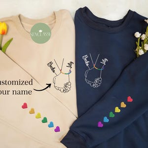 LGBT Couple Holding Hand Custom Name Embroidered Sweatshirt, Unique Gift For Partner, Personalized Valentine Hoodie, Custom Couple Crewneck