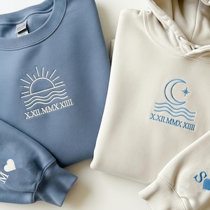 Personalized Sun And Moon Couple Hoodies With Custom Roman Numerals & Sleeve Initials - Matching His And Hers Anniversary Sweatshirt Gift