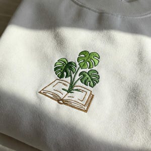 Embroidered Monstera Book Shirt, Plant Lover Bookworm Sweatshirt, Botanical Book Tee, Reading Plant Girl Shirt, Cozy Aesthetic Gift for Mom