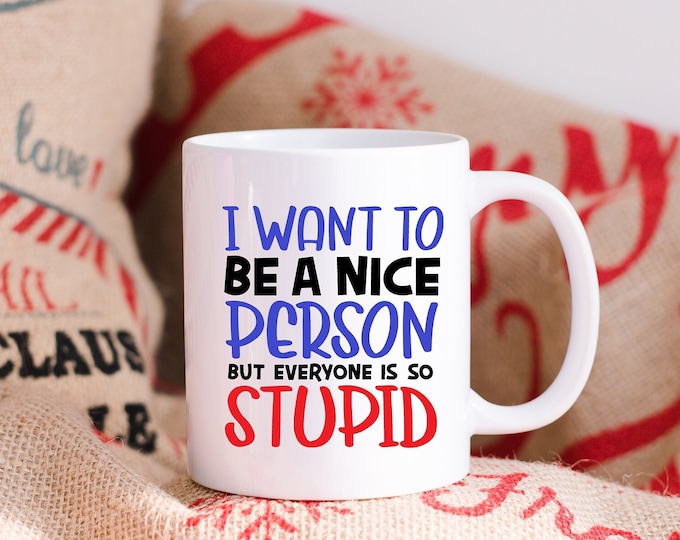 The Nice Person's Dilemma Dealing with Stupidity - Navigating Stupidity with a Smile - Nice Person Frustrating World - Trying to be Nice mug
