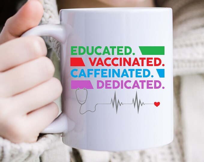 Dedicated to Thrive Educated, Vaccinated, Caffeinated, and Proud Mug - In Pursuit of Excellence - The Path of Dedication - Proud Nurse Mug