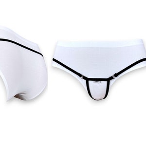 May include: White underwear with black trim and a black strap with silver buckles across the front.