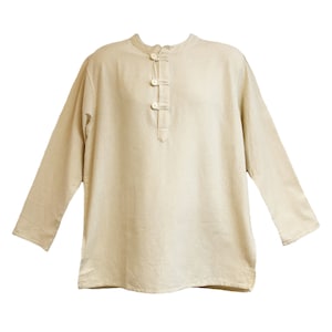 May include: A beige long-sleeved shirt with a mandarin collar and three white buttons down the front.