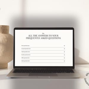 May include: A laptop displays the text "ALL THE ANSWERS TO YOUR FREQUENTLY ASKED QUESTIONS" on its screen. The laptop is open on a white surface, with a beige vase to the left. The Showit logo is in the upper left corner.