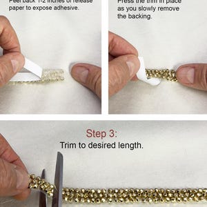 May include: A step-by-step guide for applying a decorative trim. The image shows the process of peeling back the release paper, pressing the trim, and trimming it to the desired length. The trim is gold-colored and embellished with small, round beads.