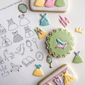 Peut inclure: Un assortiment de biscuits sur le thème des princesses et un modèle. Les biscuits comprennent des robes jaunes, roses et vertes, un chausson de verre, une couronne et un château. Le modèle présente des contours de robes et d'autres éléments de conte de fées.