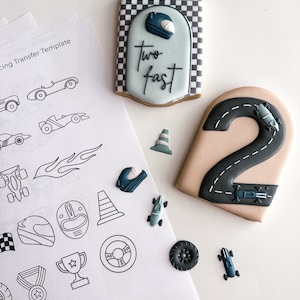 May include: A set of cookie cutters for a racing themed birthday party. The cutters include a race car, a checkered flag, a trophy, a steering wheel, a helmet, a cone, and a tire. The cutters are made of metal and are designed to cut out cookies in the shape of racing-themed objects.