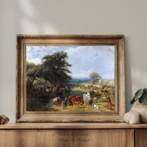 May include: A vintage oil painting depicting a large group of horses and people in a grassy field. The painting is framed in a rustic wooden frame.