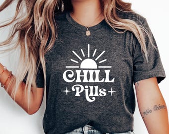 Chill Pills T-Shirt, Funny Relaxation Quote Tee, Quirky Stress Relief Apparel, Humorous Self-Care Graphic Shirt, Cool Gift for Calm Vibes