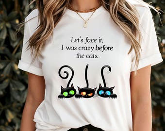 May include: White t-shirt with a black cat graphic and the text "Let's face it, I was crazy before the cats."