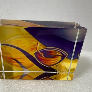 Atlanta Thrashers Glass Paper Weight.