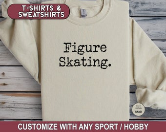May include: A beige sweatshirt with the text "Figure Skating." printed in black. The sweatshirt is shown in the color "Sand".