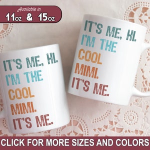 May include: Two white ceramic mugs with the text "It's me, hi. I'm the cool mimi. It's me." printed in different colors. The mugs are available in 11oz and 15oz sizes.