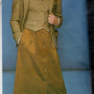 May include: A vintage ensemble featuring a brown tweed blazer, vest, and button-down skirt. The outfit includes a white collared shirt, patterned tie, and brown and yellow shoes. The model is wearing white socks.