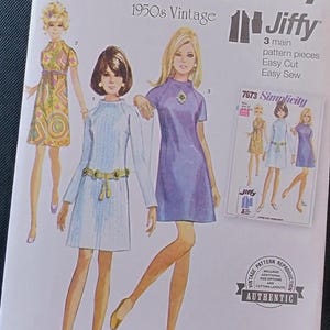 May include: Vintage Simplicity sewing pattern for a 1950s Jiffy dress. The pattern includes three main pieces, is easy to cut and sew, and comes with additional size options and cutting layouts. The pattern is for sizes 8-16, 34-42, and 36-44.