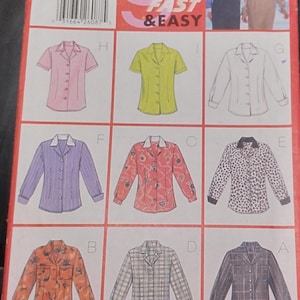 May include: Butterick sewing pattern 5153 featuring nine shirt designs. The pattern includes short and long sleeve options in various colors and patterns, including pink, yellow, and plaid. The text "FAST & EASY" is also visible.