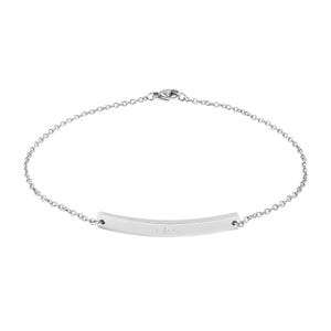 May include: A delicate silver bracelet featuring a curved bar pendant. The bracelet has a fine chain and a simple clasp. The bar pendant has a subtle inscription. The jewelry is minimalist and elegant.