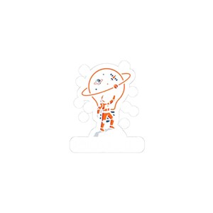May include: A sticker featuring an astronaut in an orange spacesuit holding up a lightbulb-shaped planet with a ring around it. The planet has stars and a satellite. The astronaut stands on a cloud-like shape. The sticker is white with an orange and blue design.