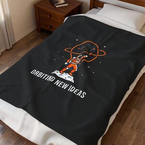 May include: A set of three ceramic nesting bowls in shades of blue, green, and white. The bowls feature a speckled glaze and a simple, modern design. The largest bowl measures approximately 6 inches in diameter.
