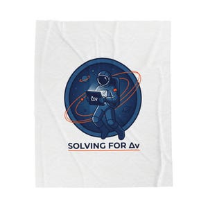 May include: White blanket featuring a cartoon astronaut in a blue spacesuit holding a tablet with the letters "Δv". The astronaut is set against a blue planet with orange orbital rings. The text "SOLVING FOR Δv" is below the astronaut.