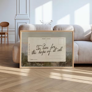 Vintage postcard wall art featuring the handwritten quote “To live for the hope of it all” in a nostalgic romantic aesthetic with soft neutral tones.