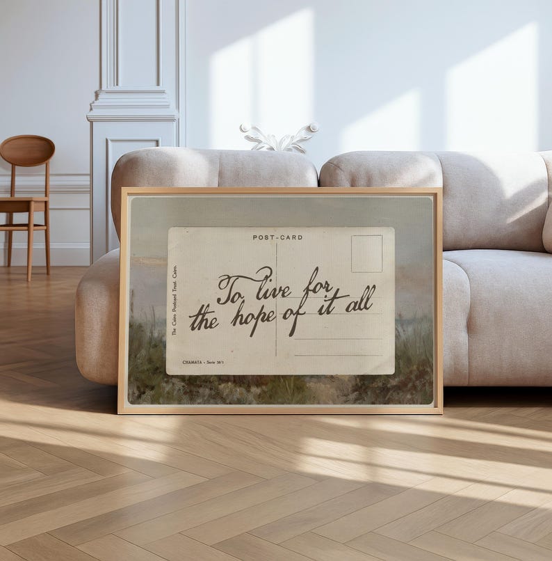 Vintage postcard wall art featuring the handwritten quote “To live for the hope of it all” in a nostalgic romantic aesthetic with soft neutral tones.