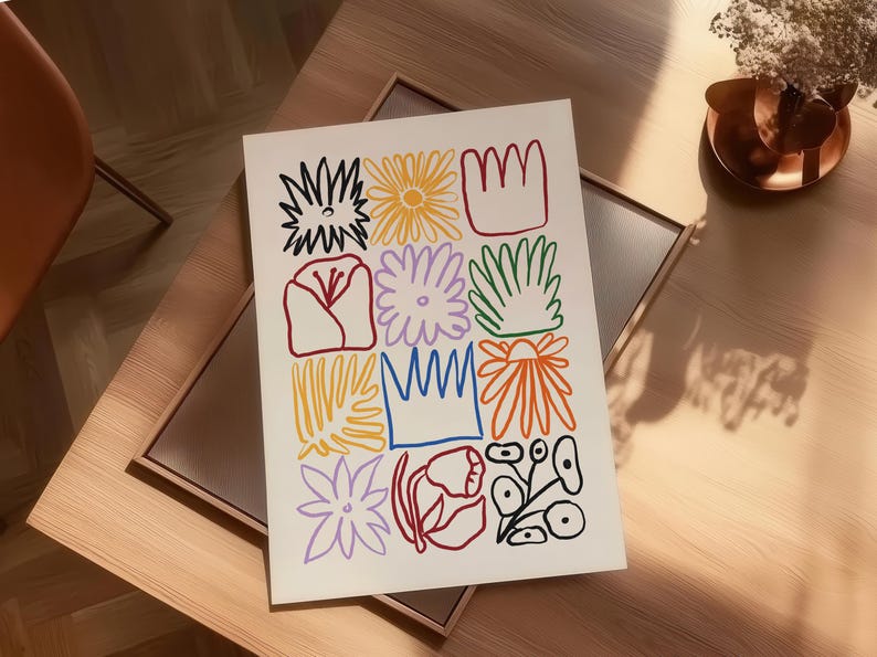 Bring color and charm to your space with this whimsical floral art print! Featuring a playful grid of abstract flower and leaf illustrations in bright, bold colors, this piece is perfect for adding a modern touch to eclectic, boho, or minimalist decor. Printed with a hand-drawn, artsy feel, it’s a great fit for living rooms, bedrooms, studios, or gallery walls.