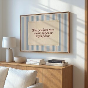 Framed custom quote printable with vintage cream parchment and pale blue vertical stripes. Editable wall art for personalized messages, lyrics, or names – perfect for baby gifts, coastal decor, or soft romantic spaces.