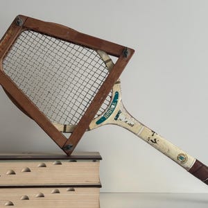 Vintage Wooden Tennis Racket: Rustic Sports Decor
