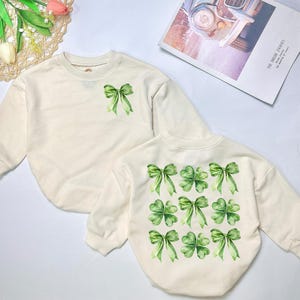 St. Patrick’s Day Bow Shamrock Romper Sweater, St Patricks Coquette, St Patricks Four Leaf Clover Bodysuit, Checkered, Baby Shower