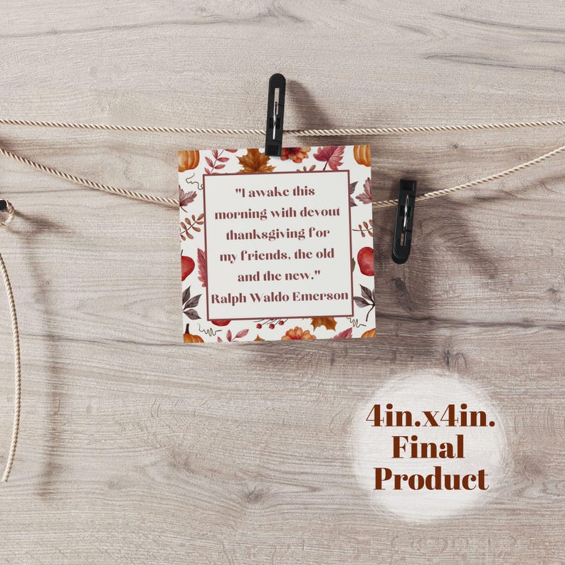 May include: A square card, 4 inches by 4 inches, with a Thanksgiving theme, is suspended by a clothesline. The card features a quote by Ralph Waldo Emerson surrounded by fall leaves and pumpkins. The words "Final Product" are also visible.