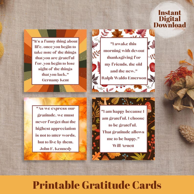 May include: Four printable gratitude cards with quotes by Gernamy Kent, Ralph Waldo Emerson, John F. Kennedy, and Will Arnett. The cards have autumn-themed designs with leaves and pumpkins. The words "Printable Gratitude Cards" are at the bottom.