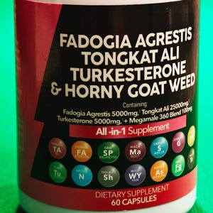 May include: White bottle of dietary supplement capsules with a white lid. The label features the text "Fadogia Agrestis Tongkat Ali Turkesterone & Horny Goat Weed" and other supplement information. The bottle contains 60 capsules.