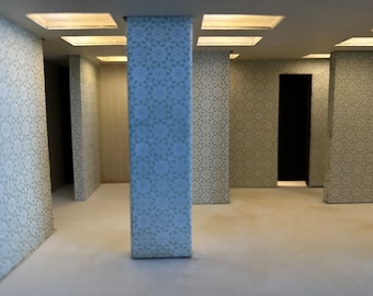 May include: A model of a room with white walls and a patterned design. The room has a doorway and several pillars. The room is lit by overhead lights.