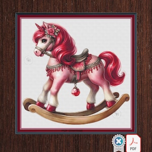 Caballito balancín rubí. Bordado a punto de cruz grande. Compatible con Pattern Keeper/Markup. Hilos DMC. Descarga en PDF.